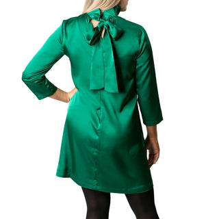 Green dress with ruffle high neck and ribbon tie in the back