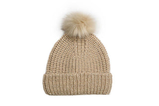 Camel knit hat with coordinating pom pom.