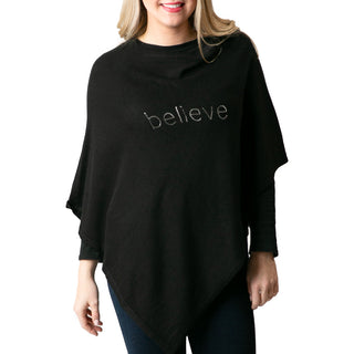 black knit poncho with believe in silver sequins