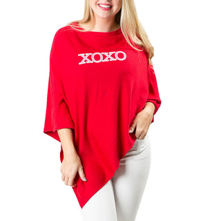 Red poncho with "xoxo" in white letters