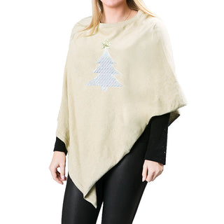 tan knit poncho shawl with white cable knit christmas tree