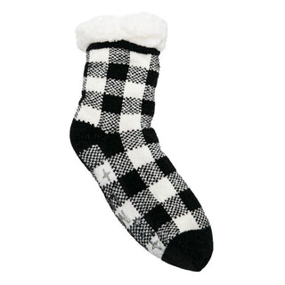 White and black plaid slipper sock with white faux Sherpa fur at top.