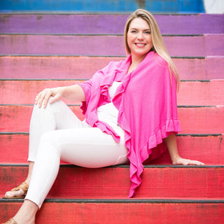 magenta pink ruffle wrap over white jeans and top