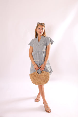 Roxy Half Circle Bag in natural straw with round handles, lightweight half-moon tote for summer.