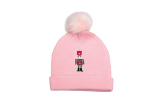 Pink knit hat with embroidered nutcracker