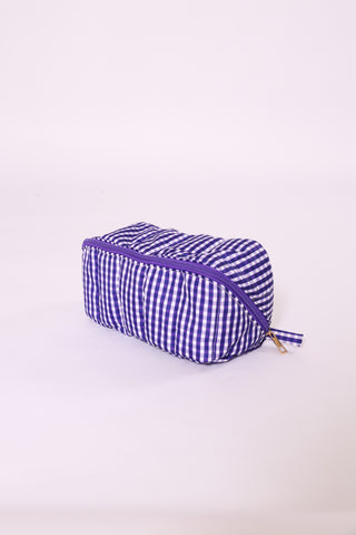 Royal blue gingham glam bag with zipper top – perfect for gameday or travel.