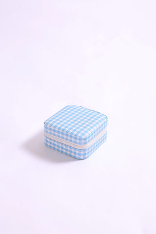 Compact jewelry travel organizer in pastel blue gingham print.