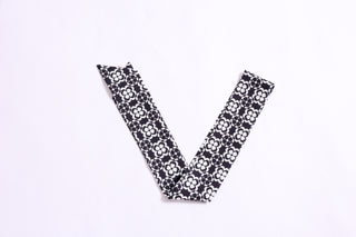 Monochrome floral twillie scarf for hair or handbag accent.