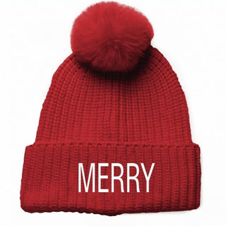 Red knit beanie hat with coordinating faux fur pom pom with embroidered white MERRY