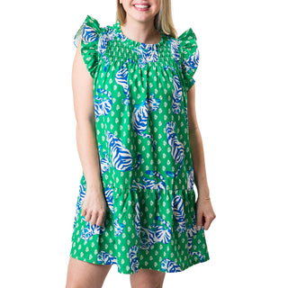 Above the knee dress with cap flutter sleeves, smocked above the chest