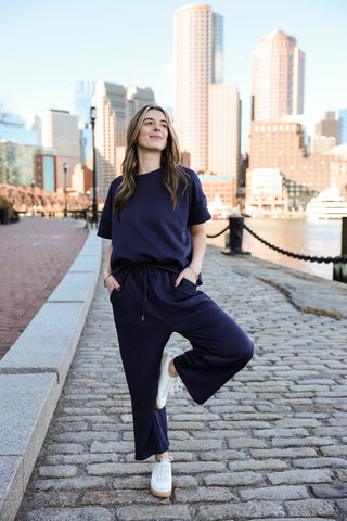 women wearing matching navy set