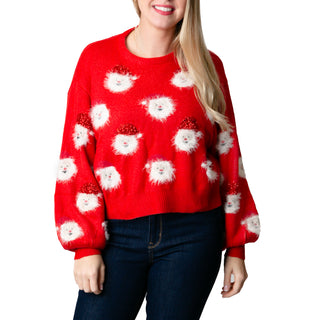 Red sweater with Santa faces