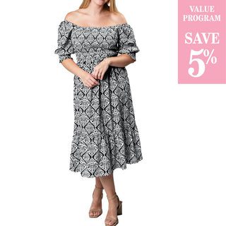 Tiered, smocked torso dress that can be worn on or off the shoulder.