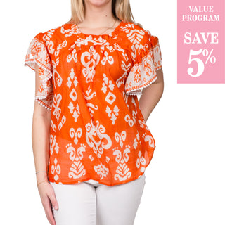 orange with paisley flutter top sold in size assortment