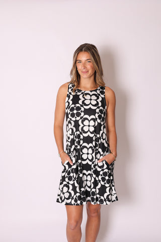 Sophia Dress in bold Black and White Floral print, sleeveless with pockets.