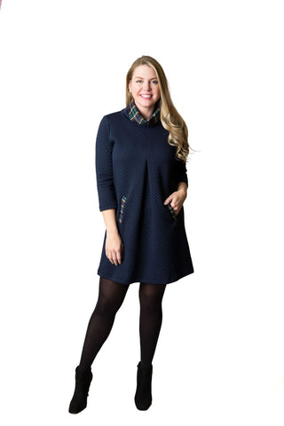 Navy quilted dress with plaid collar and plaid detail on pockets