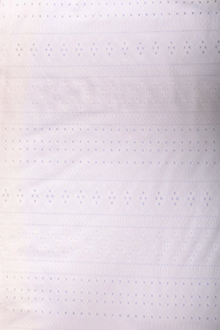 Swatch of the Goldie Eyelet Top in white.