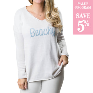 white v-neck sweater with Beachy written in light blue script
