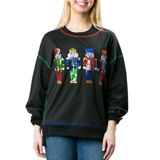 Black sweatshirt with sequined multicolor nutcrackers