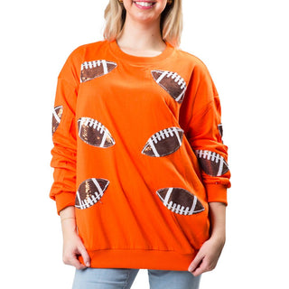 Orange sweatshirt with sequined footballs