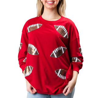 Red sweatshirt with sequined footballs