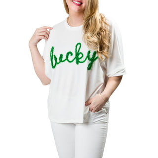 Elbow-sleeved crewneck shirt with the word lucky written in green garland on front