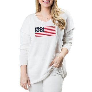 White sweater with American flag patch