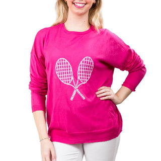 Pink sweater with white rackets