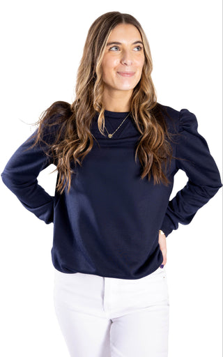 Navy top with long sleeves and puff shoulders
