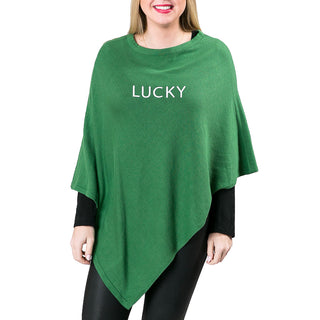 green knit poncho  with LUCKY in white embroidery