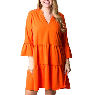 Tiered, flutter sleeve dress in Orange