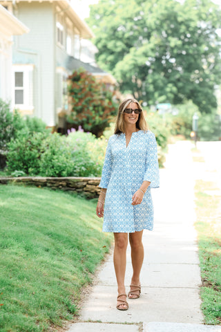 Mira Dress styled with accessories in vibrant blue print for summer
