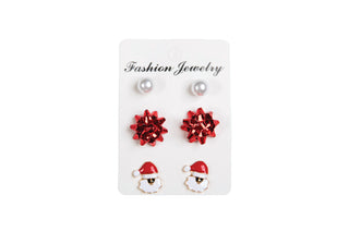 Earring set with pearls, red bows and Santa Claus face
