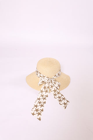 Brigitte Twillie Ribbon Hat featuring a white ribbon with gold starfish print bow
