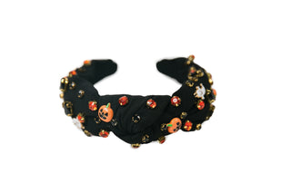 Black headband with orange and pumpkin beads