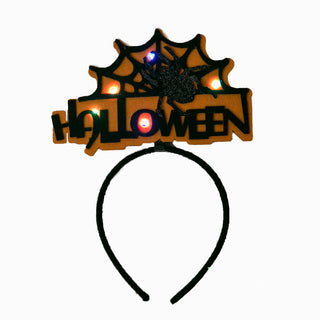 Black and orange Halloween spiderweb and spider headband with lights, with lights on
