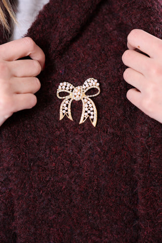 magnetic gold bow brooche