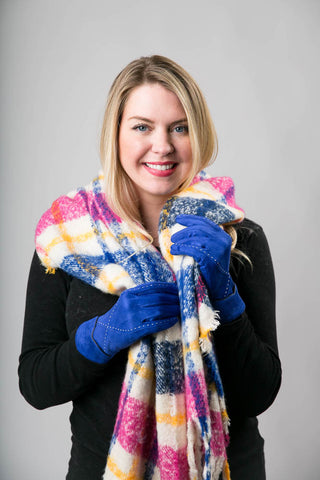 Woman wearing a colorful pink indie scarf