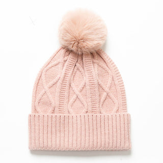 Light pink Karen cable knit beanie hat with coordinating pom pom