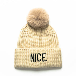 Light Camel Joyce hat with NICE embroidered in black and light camel pom pom