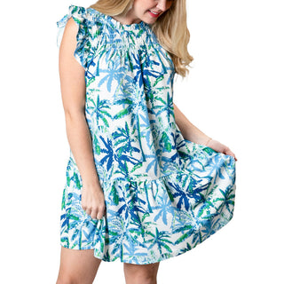 Green and Blue Palm print dress with cap flutter sleeves, smocked above the chest