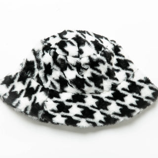 Jelissa faux fur bucket hat in black and white houndstooth