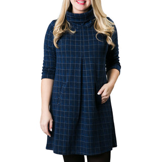 Navy and white window pane plaid print jacquard knit tunic dress with three quarter sleeves, turtleneck and front pleat
