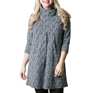 Navy zig zag print jacquard knit tunic dress with three quarter sleeves, turtleneck and front pleat