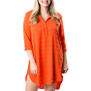 Orange tunic dress with V-neck, lapel collar, 3/4sleeves, side-slit, longer back hem-line, textured polka-dots