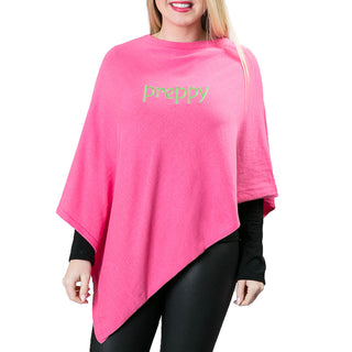 pink knit poncho with preppy in green embroidery