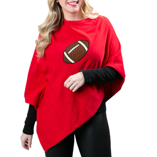 Red knit poncho with embroidered football