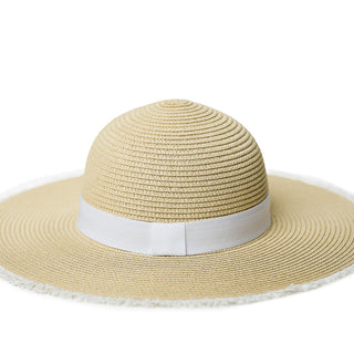Natural wide brimmed hat with white ribbon on crown and white eyelash trim on brim