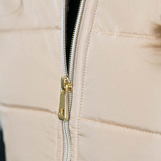 close up of zipper on Camel Penelope Puffer Vest with 1/4 sleeves