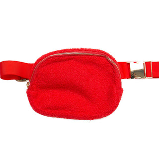 red  plush crossbody bag with matching strap